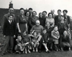 With our extended family at Hollington in 1950. I'm the little boy standing on the left, being hugged by my sister Margaret.